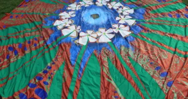 Colorful round piece of fiber art fabric