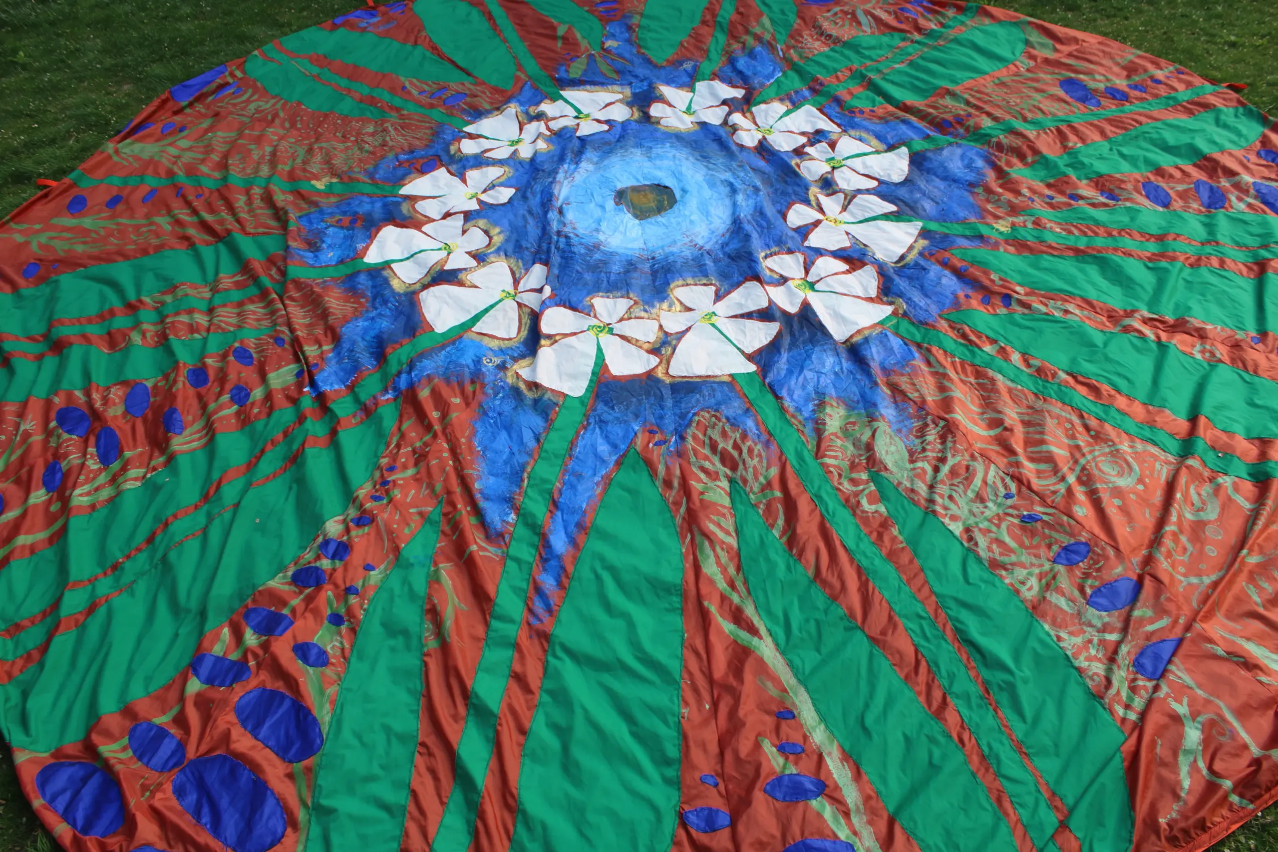 Colorful round piece of fiber art fabric 