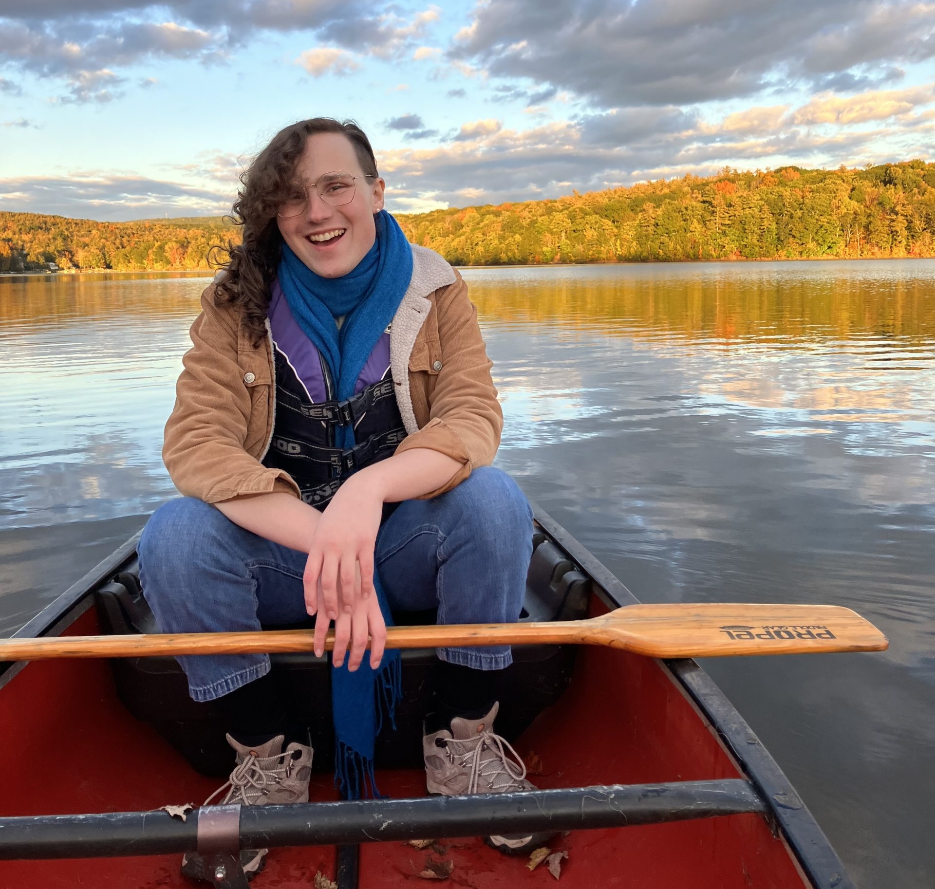 Photo of Veronica in a canoe at twilight