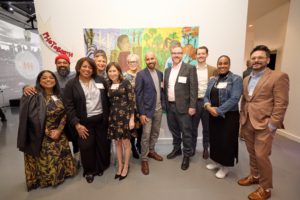 Group portrait of diverse members of Community-Word Project's board of directors