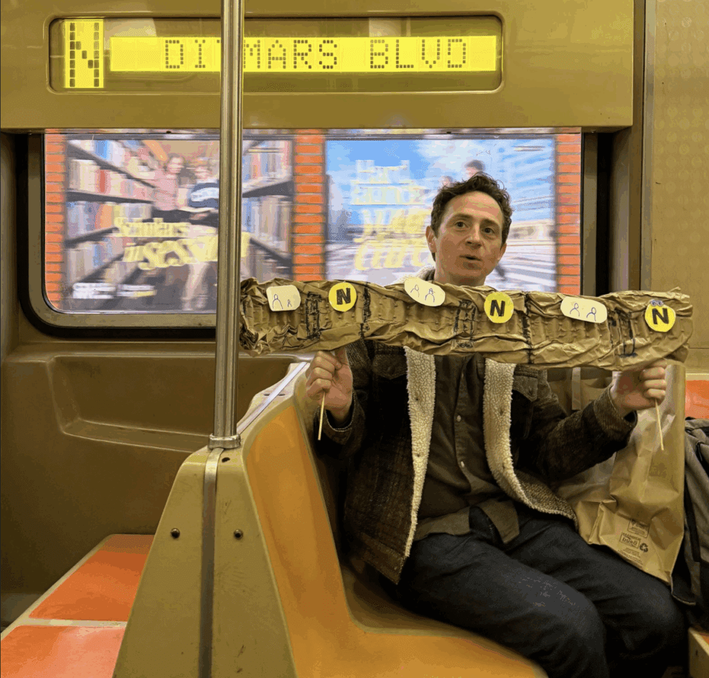 Man riding the NYC subway