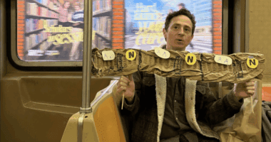 Man riding the NYC subway