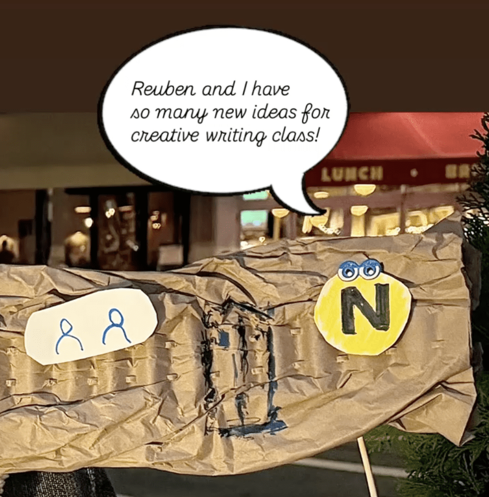 Puppet made of craft paper to look like a subway train