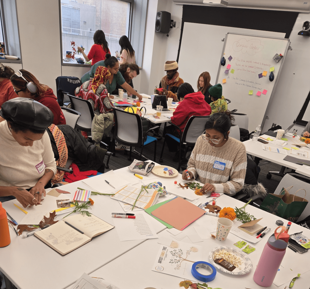 Artists participating in a creative elements workshop