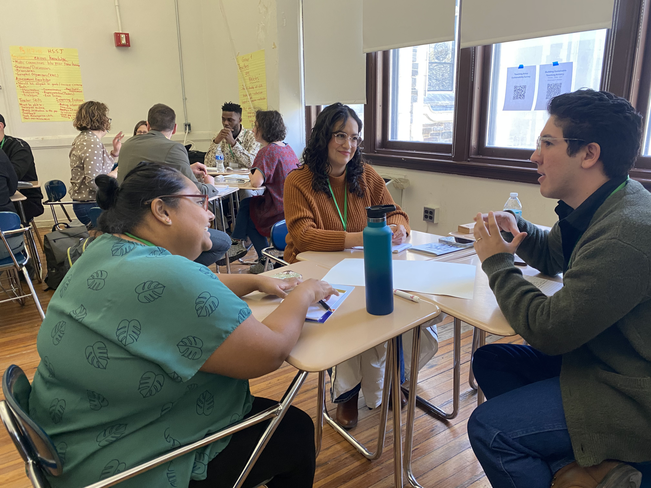 Teaching artists at a breakout session in a facilitated conference about teaching artist sustainability 
