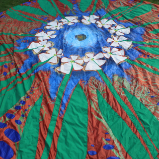 Colorful round piece of fiber art fabric
